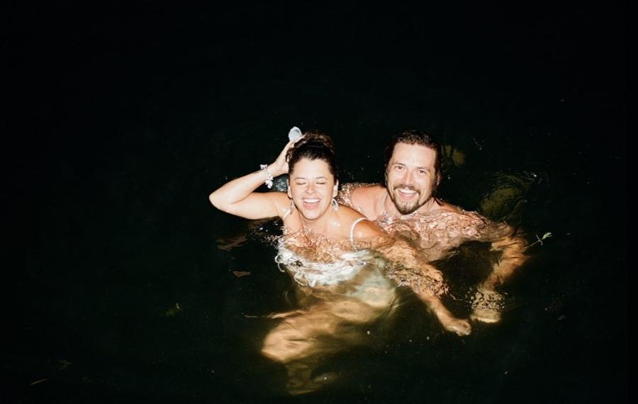 Ali and Sig laughing during a night swim